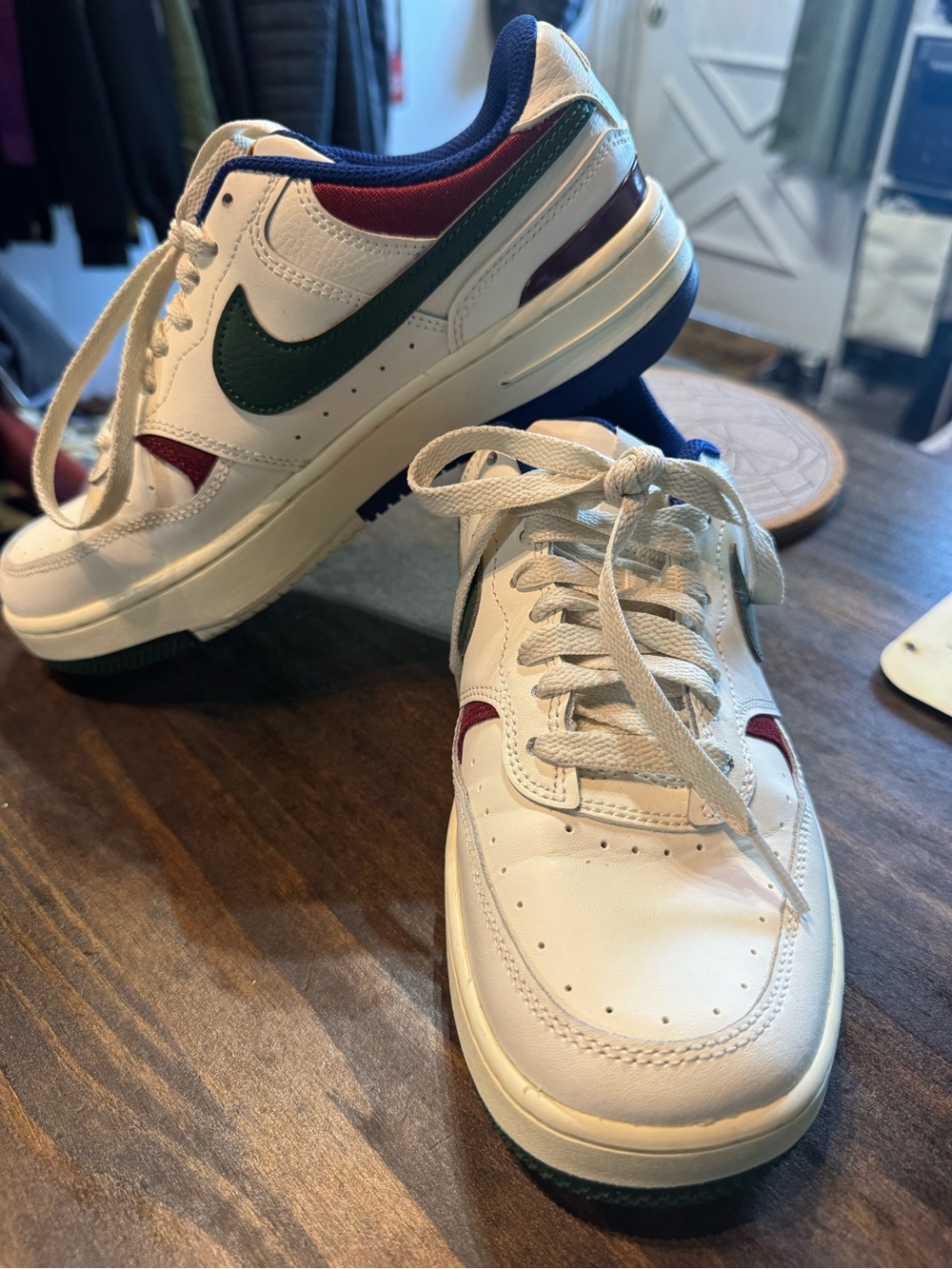 Nike White Low-Top Sneakers with Green Swoosh and Navy & Burgundy Accents